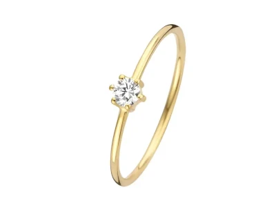 Anillo fino de oro amarillo con una pequeña piedra en engaste de seis puntas