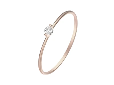 Anillo minimalista ultradelgado en oro rosa con una pequeña piedra en engaste de seis garras