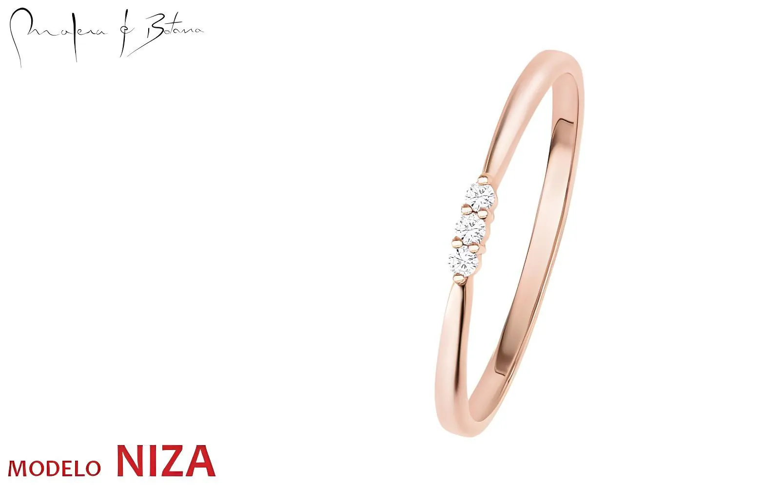 Anillo delicado de oro rosa con tres pequeñas piedras en línea sobre una banda fina y elegante