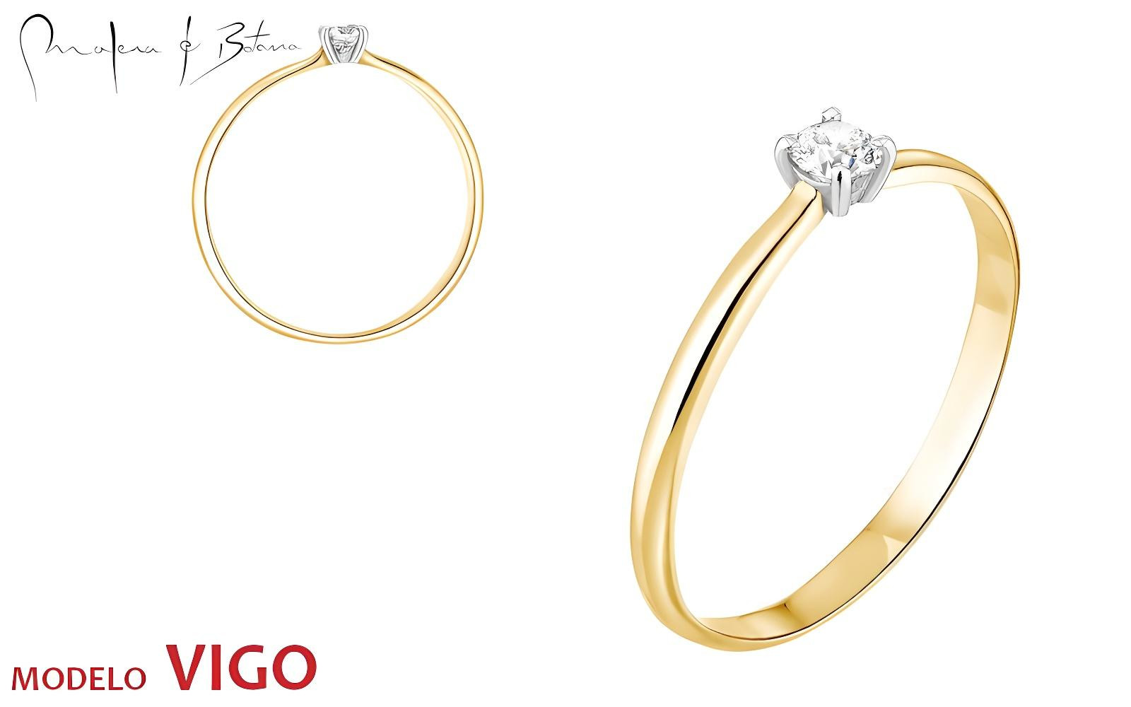 Anillo de oro amarillo con engaste de una piedra en oro blanco