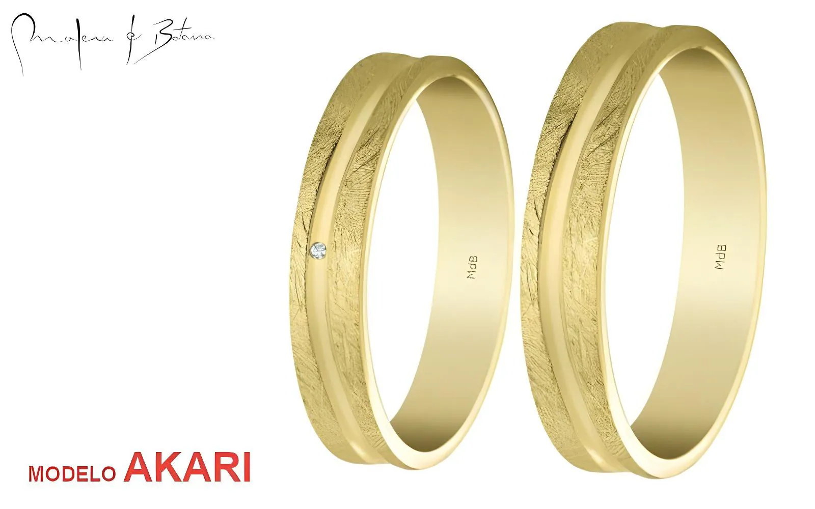 Par de anillos de boda en oro amarillo con diseño texturizado y una pequeña piedra en uno de ellos
