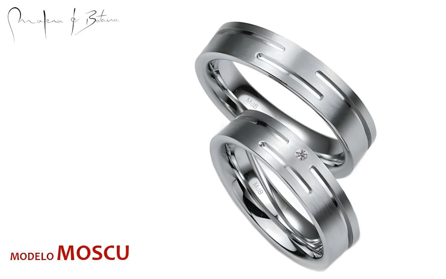 Par de anillos de boda en oro con ranuras lineales y acabado satinado