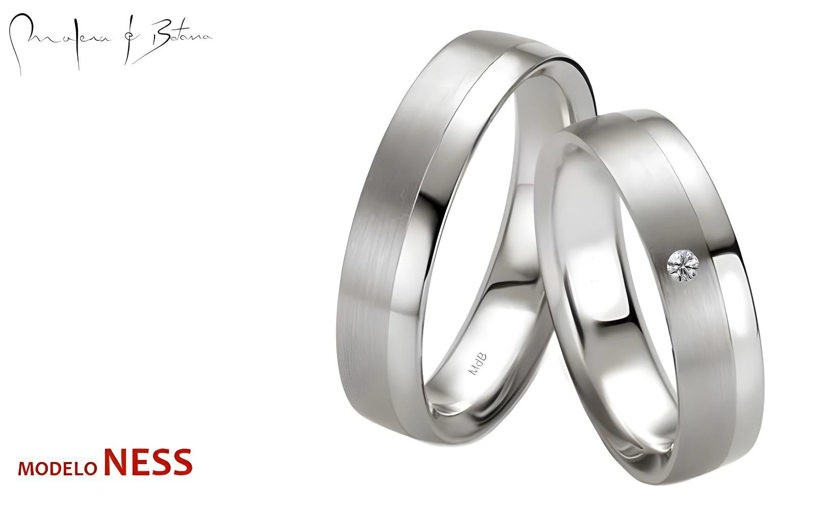 Par de anillos de matrimonio de oro con acabado mate y una piedra en uno de los anillos, diseño minimalista y contemporáneo.