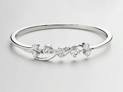 Anillo de promesa en oro blanco 18k con piedras engastados en diseño ondulante y orgánico.