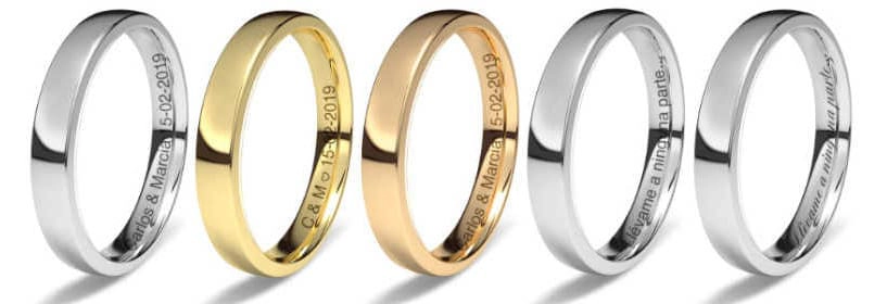 Una imagen compuesta que muestra seis anillos diferentes, incluyendo anillos de boda y anillos de compromiso en varios estilos y metales. Se pueden observar anillos lisos, anillos con incrustaciones de diamantes, anillos de oro amarillo y anillos de oro blanco. La imagen proporciona una muestra de las diferentes opciones disponibles para las parejas que buscan anillos de boda o compromiso.