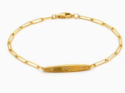 Pulsera de oro con símbolo infinito y brillantes, diseño elegante y moderno